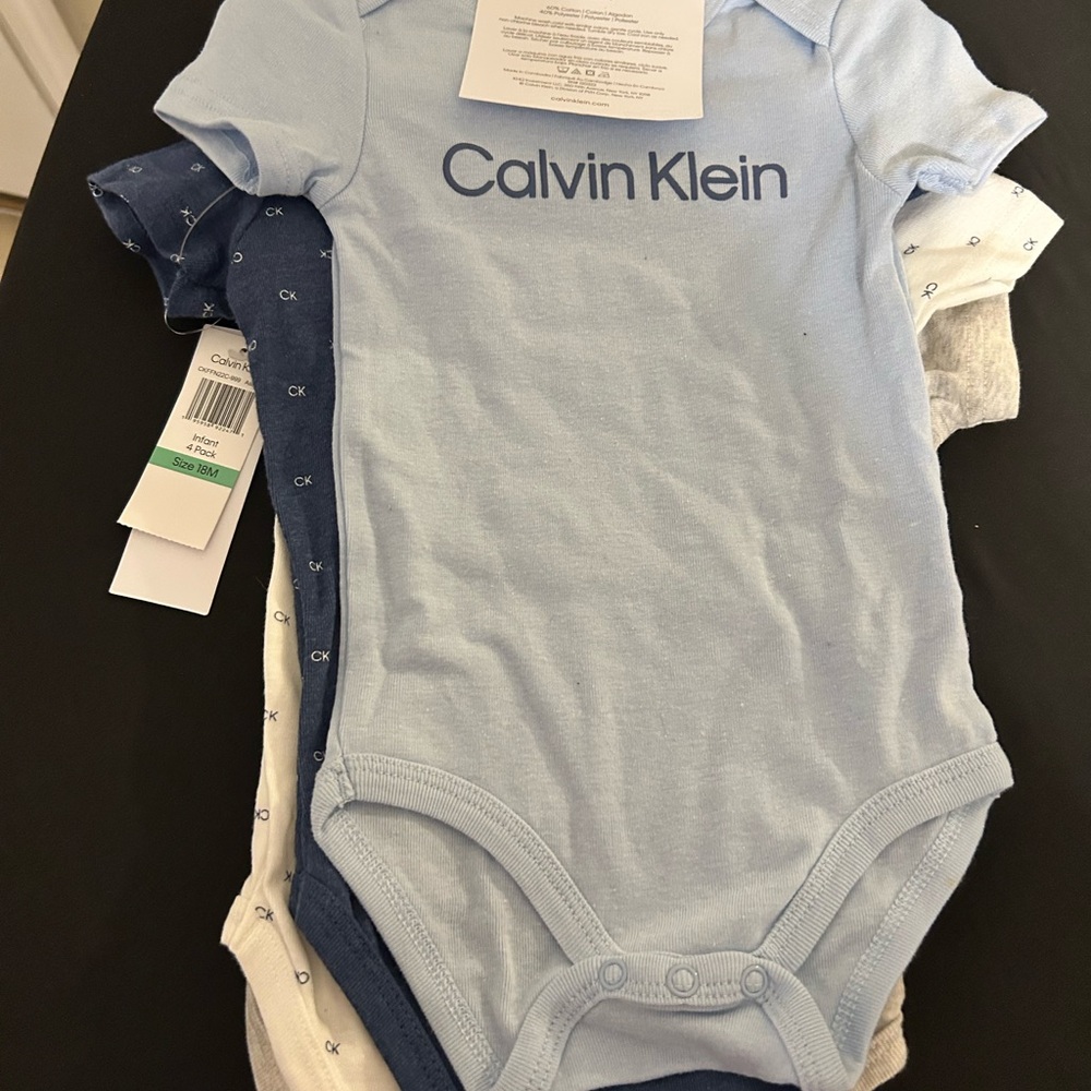 NWT  Calvin Klein 4 Pk Short Sleeve Bodysuits Size 18 Months